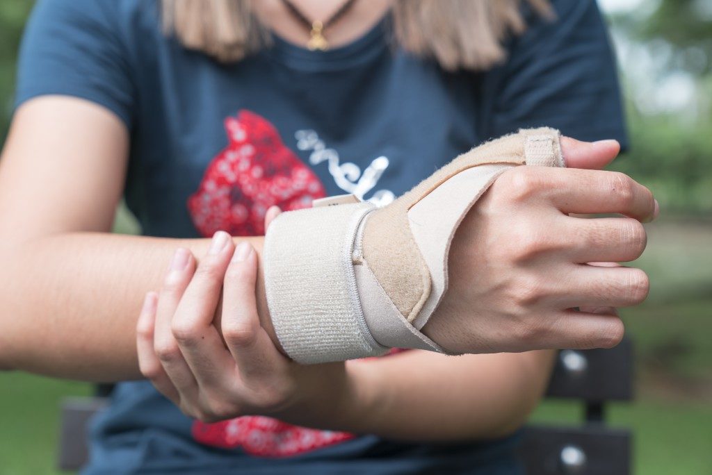Woman showing her wrist splint