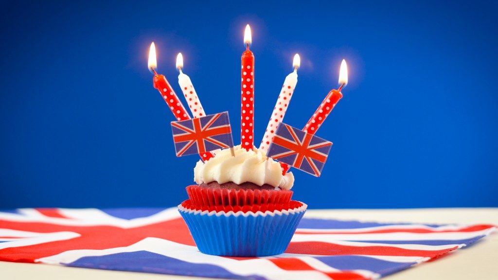 Red white and blue theme cupcakes and cake stand with UK Union Jack flags for Queen's Birthday 