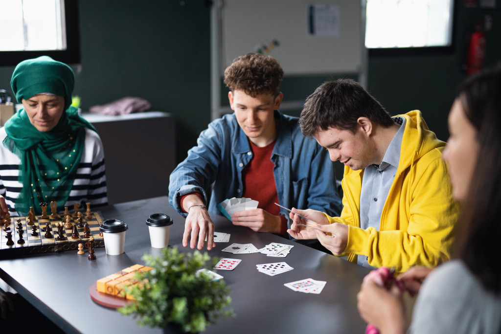 group of people playing cards